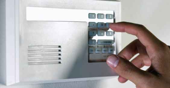 disarming alarm system --- Image by © Royalty-Free/Corbis